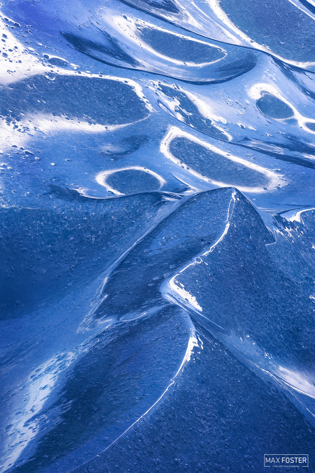 Refresh your space with Frozen Waves, Max Foster's limited edition photography print of blue ice in Jasper National Park from...