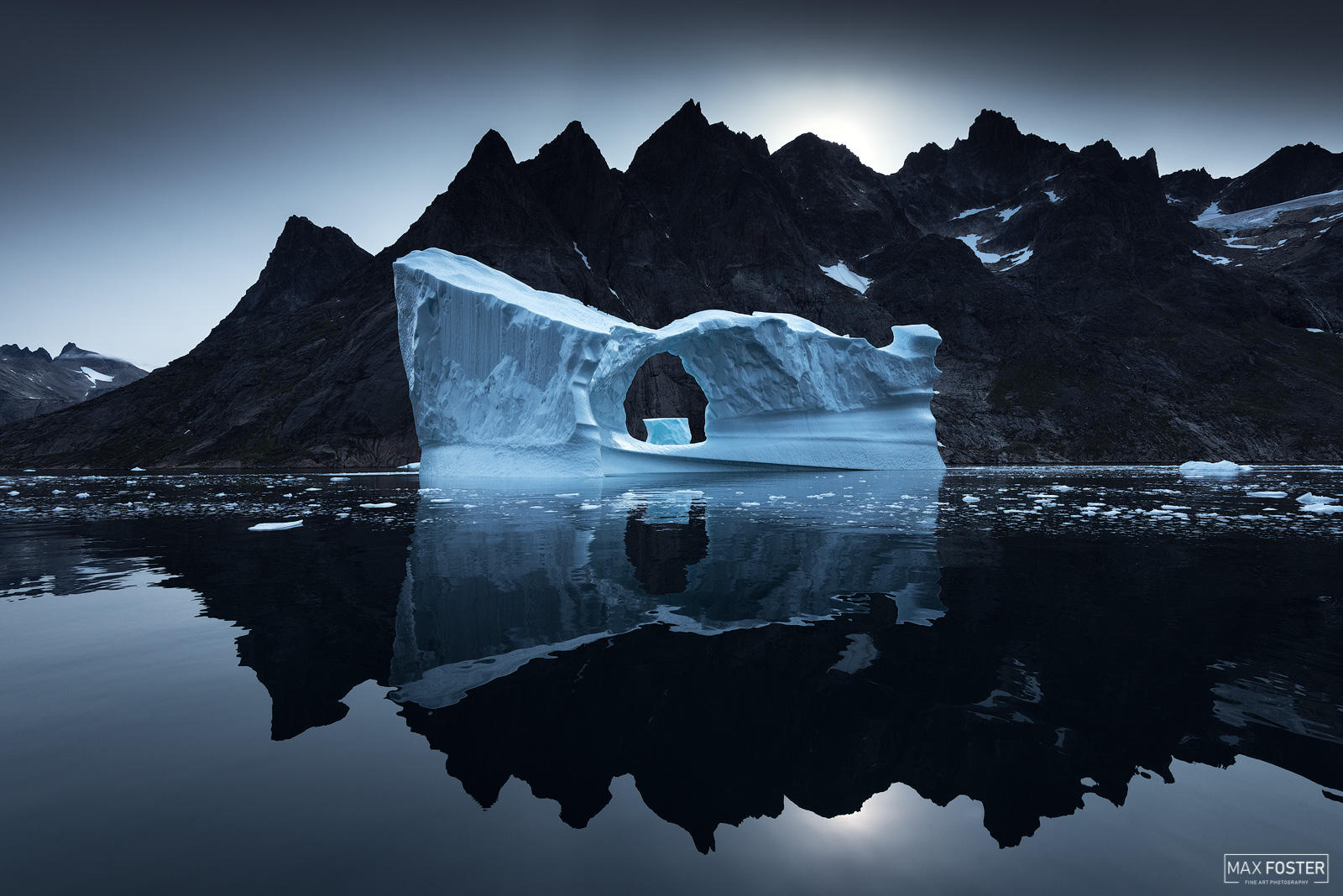 Elevate your space with Ice Castle, Max Foster's limited edition photography print of an iceberg in Southern Greenland from his...