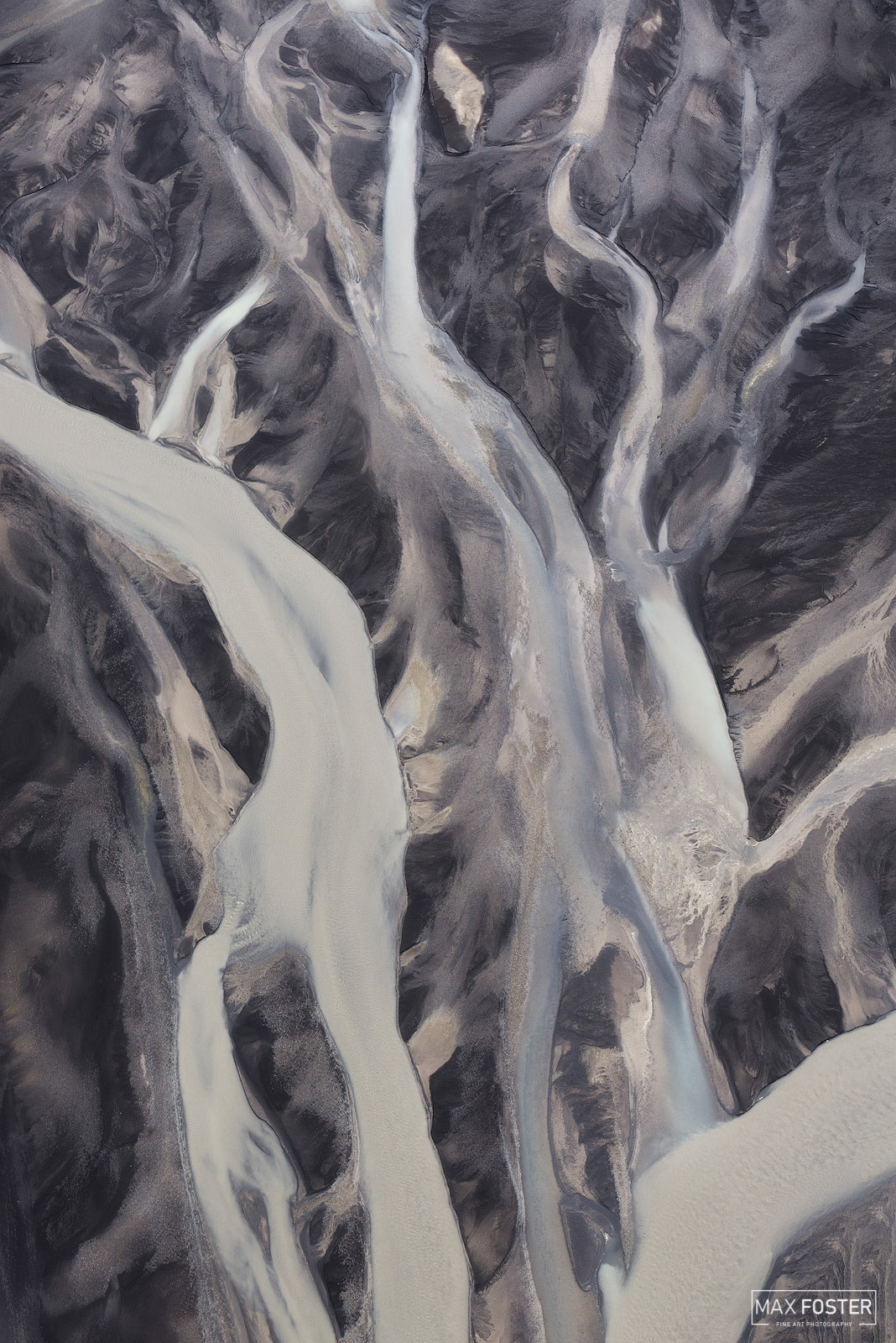 Refresh your space with Nature's Tapestry, Max Foster's limited edition aerial photography print of rivers in Iceland from his...