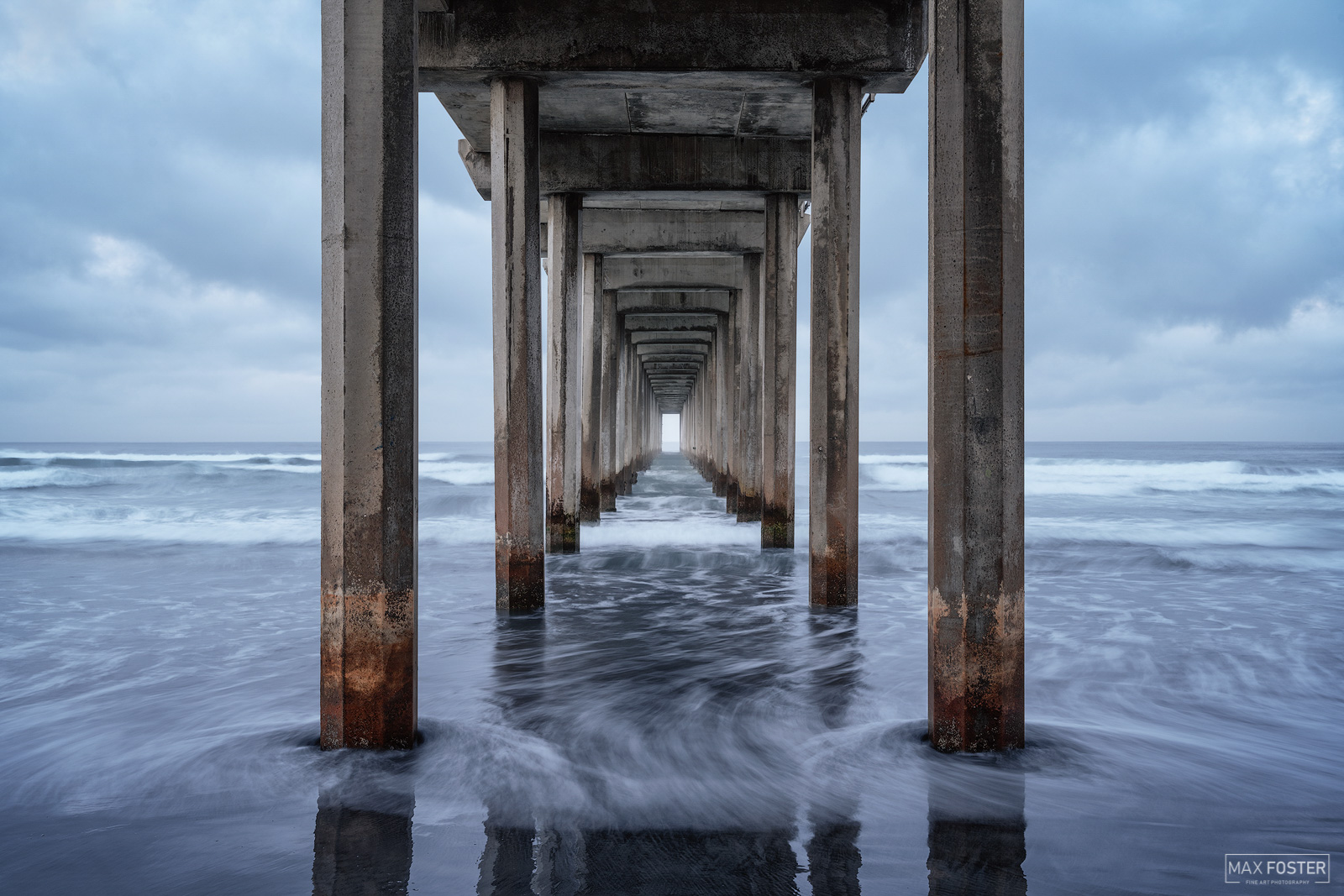 Elevate your space with Saltwater Blues, Max Foster's limited edition photography print of Scripps Pier, La Jolla from his Ocean...